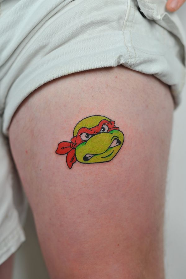 Colorful Raphael Ninja Turtle tattoo in cartoon style – custom pop culture tattoo Hanoi.