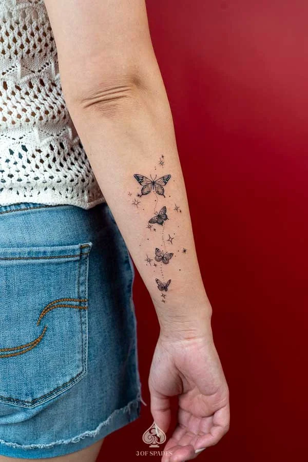 4 Butterflies Lower Arm Tattoo