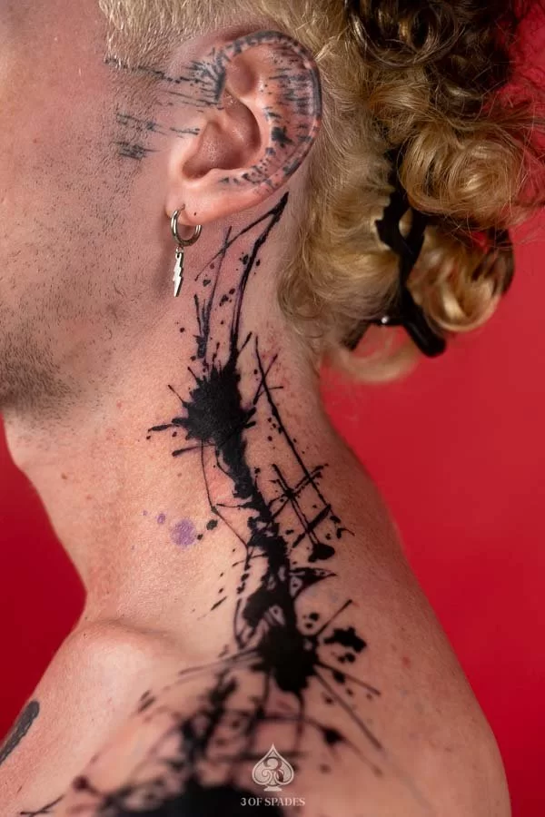 Abstract Ink Splatter Tattoo