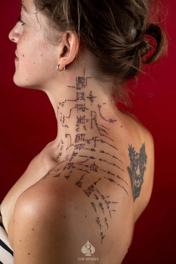 Asemic Neck Tattoo