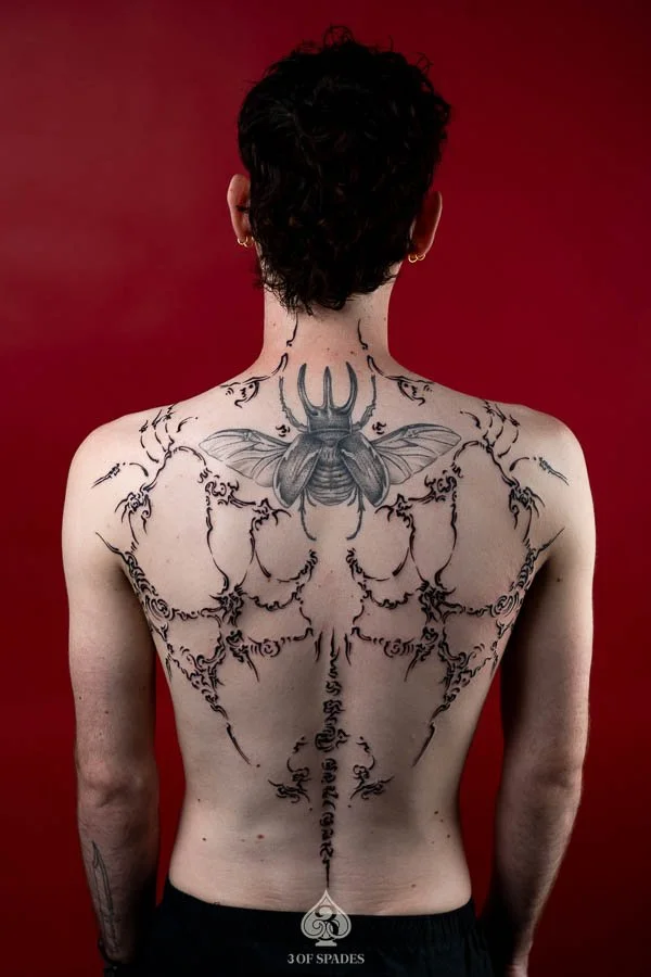 Asemic Scripture Back Tattoo | 3 of Spades Hanoi Tattoo