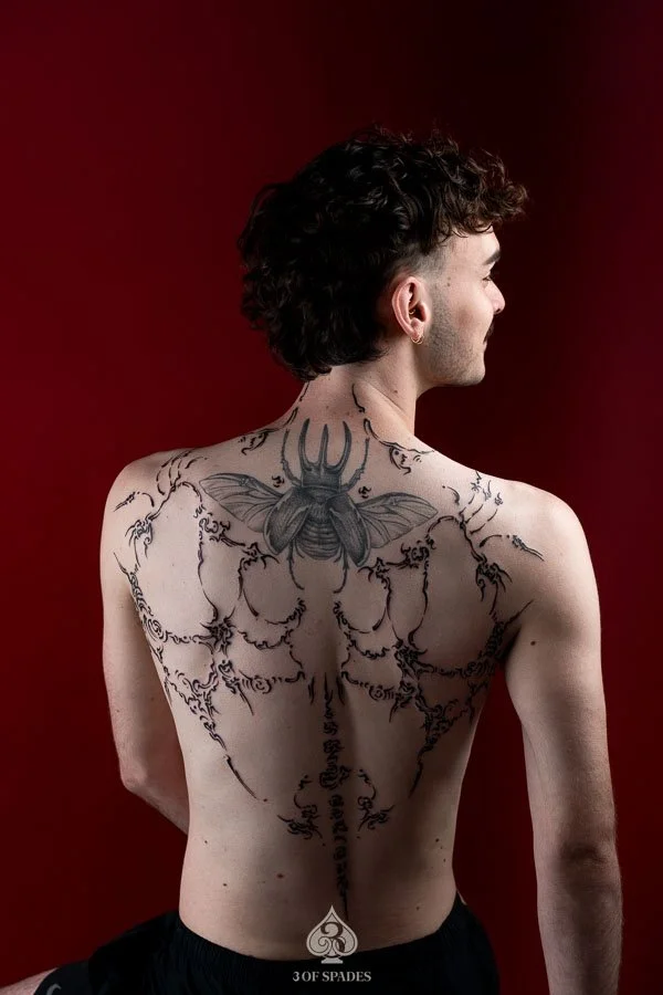 Asemic Scripture Back Tattoo | 3 of Spades Hanoi Tattoo