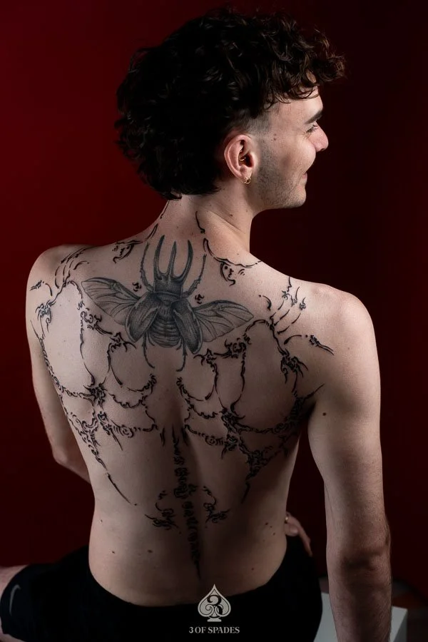Asemic Scripture Back Tattoo
