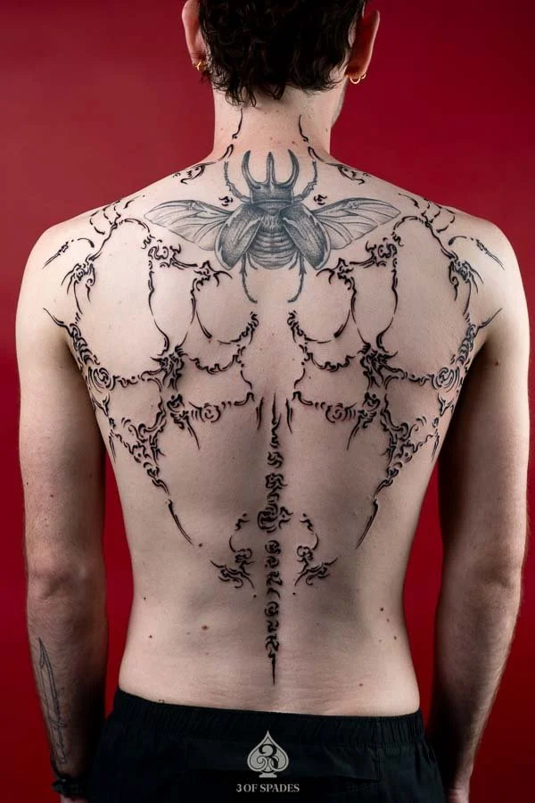 Asemic Scripture Back Tattoo | 3 of Spades Hanoi Tattoo