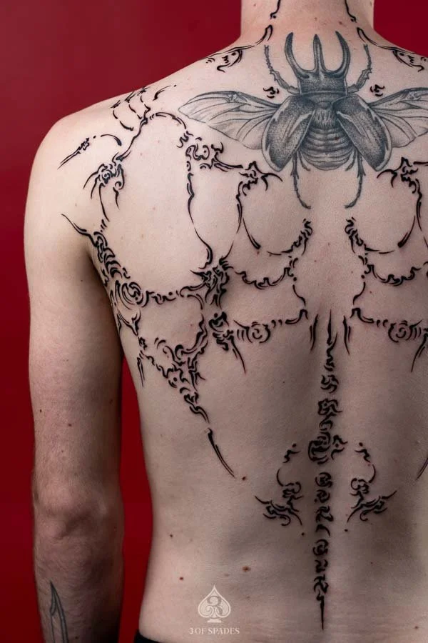 Asemic Scripture Back Tattoo | 3 of Spades Hanoi Tattoo