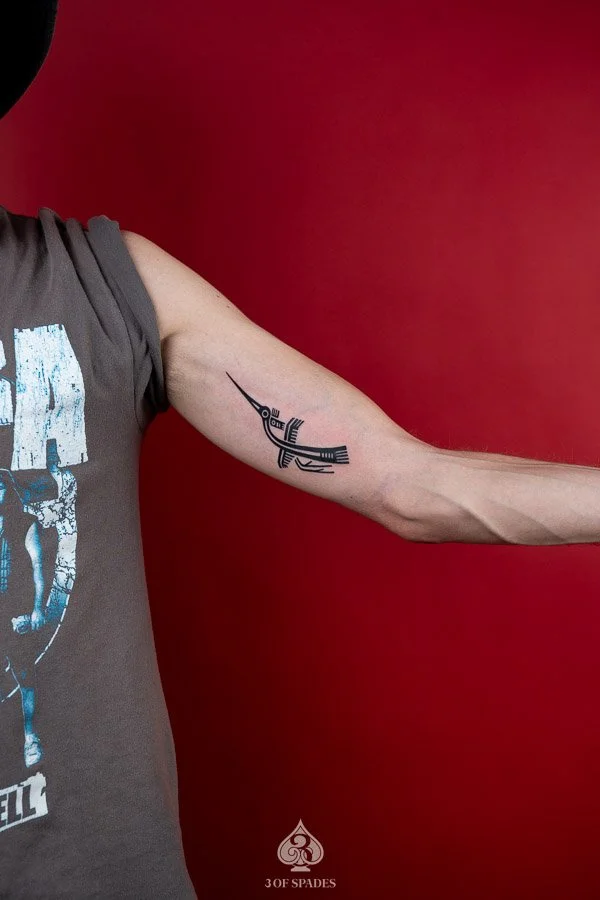 Blackwork Lạc Bird Tattoo inspired by ancient Vietnamese imagery with bold black ink and stylized traditional details at 3 of Spades Hanoi Tattoo.