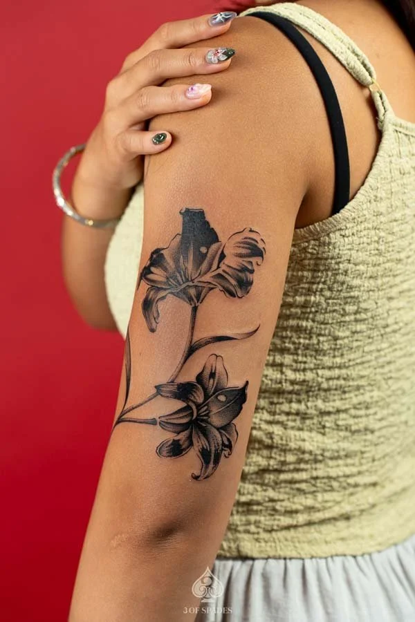 Blackwork Lily Back Arm Tattoo