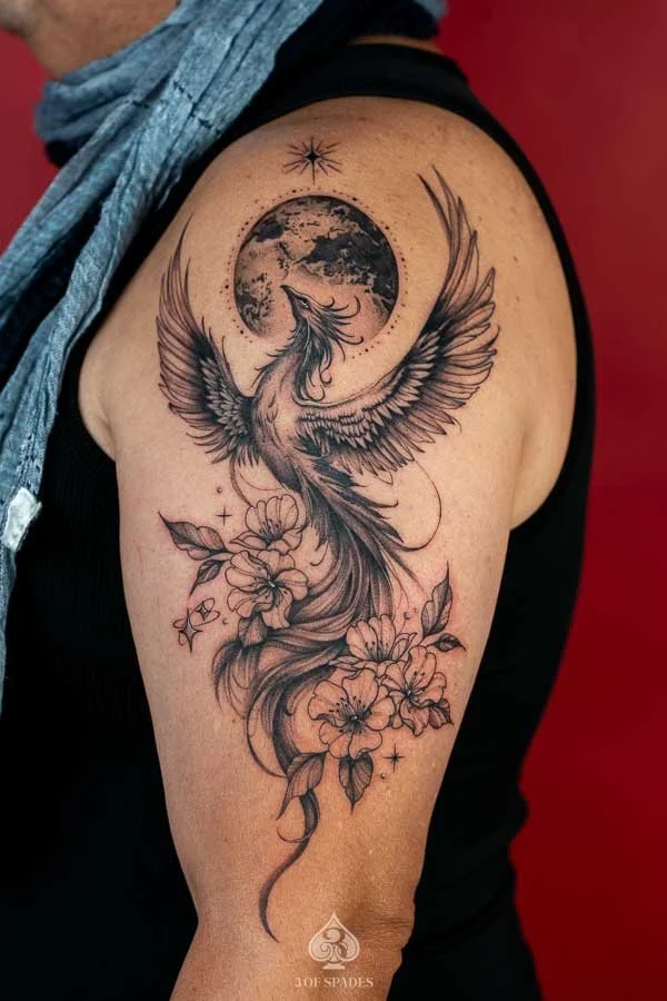 Blackwork Phoenix and Flower Tattoo