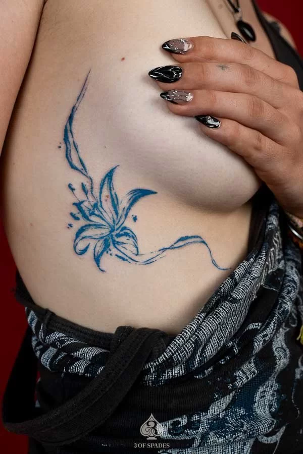 Blue Lily Flower Tattoo