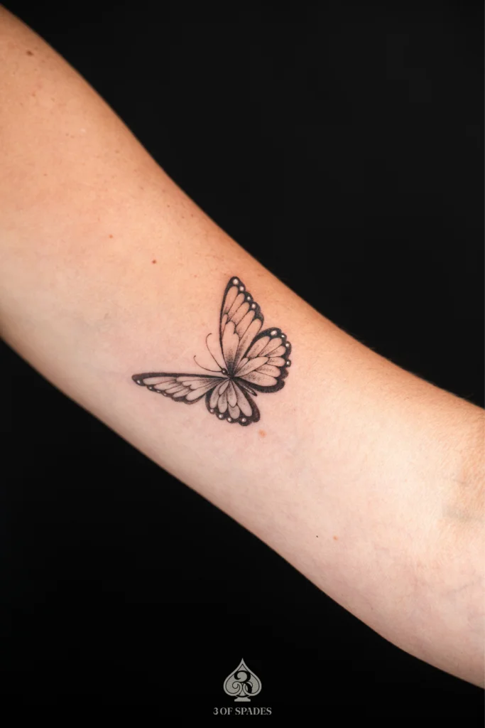 Butterfly on Bicep Tattoo by 3 of Spades Hanoi1
