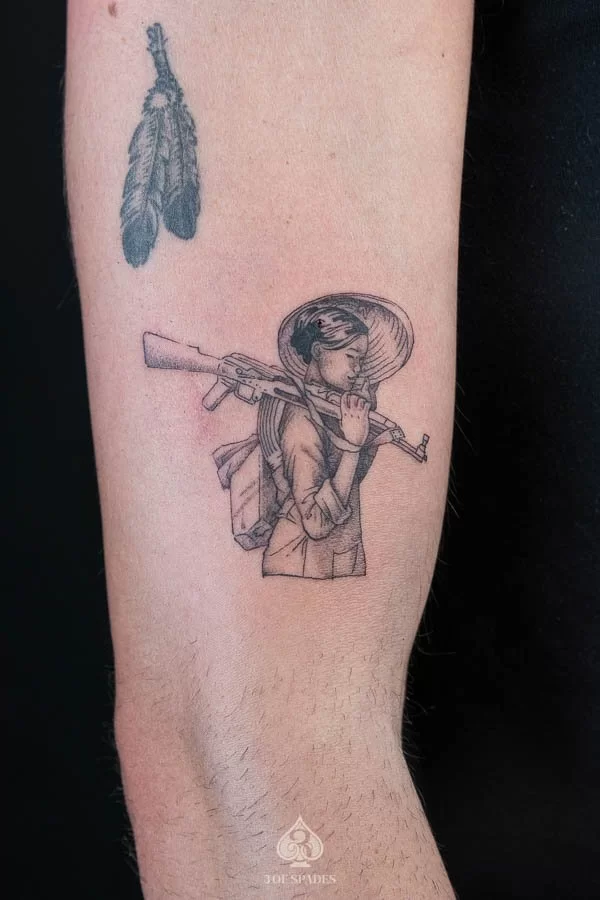 Woman Soldier Holding Guns