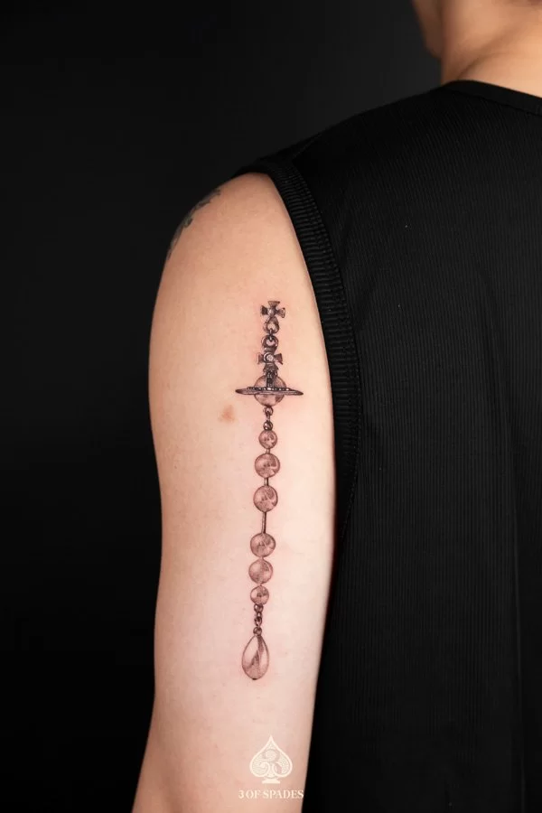 Realism Vivien Westwood Tattoo