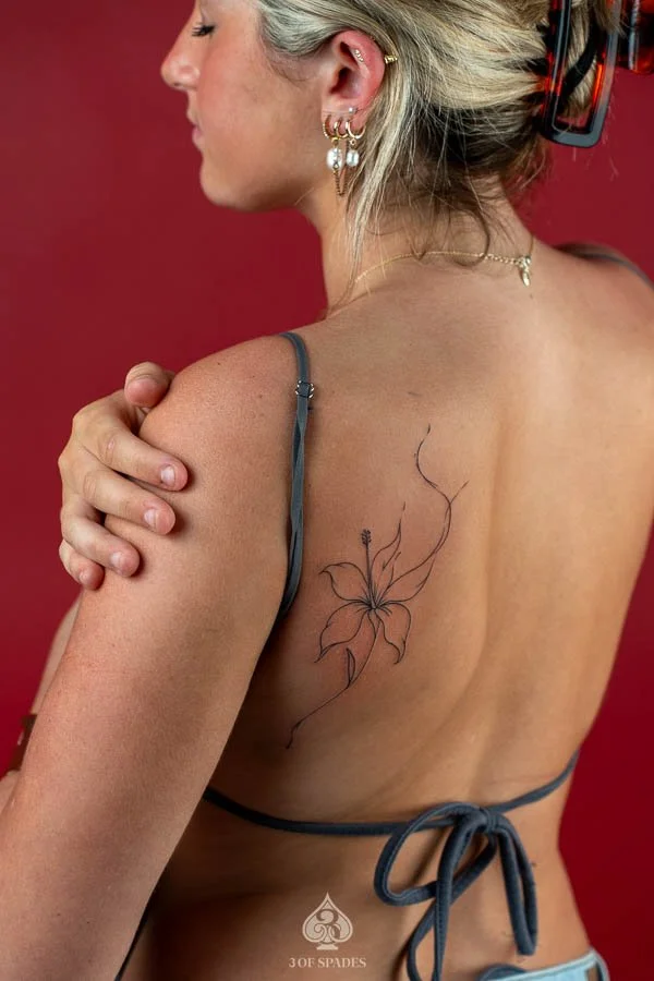 Fineline Back Flower Tattoo