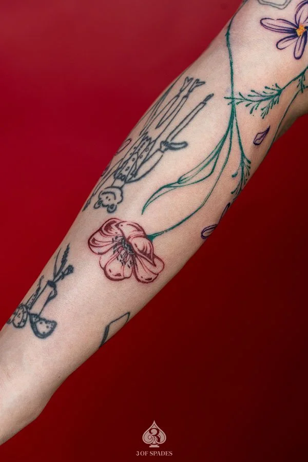 Growing Color Flower Arm Tattoo | 3 of Spades Hanoi Tattoo2