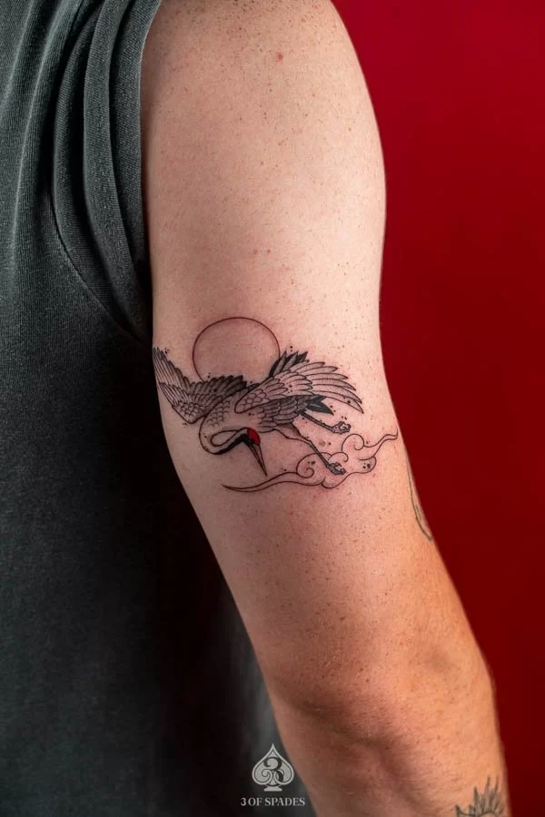 Micro-realistic Crane Tattoo
