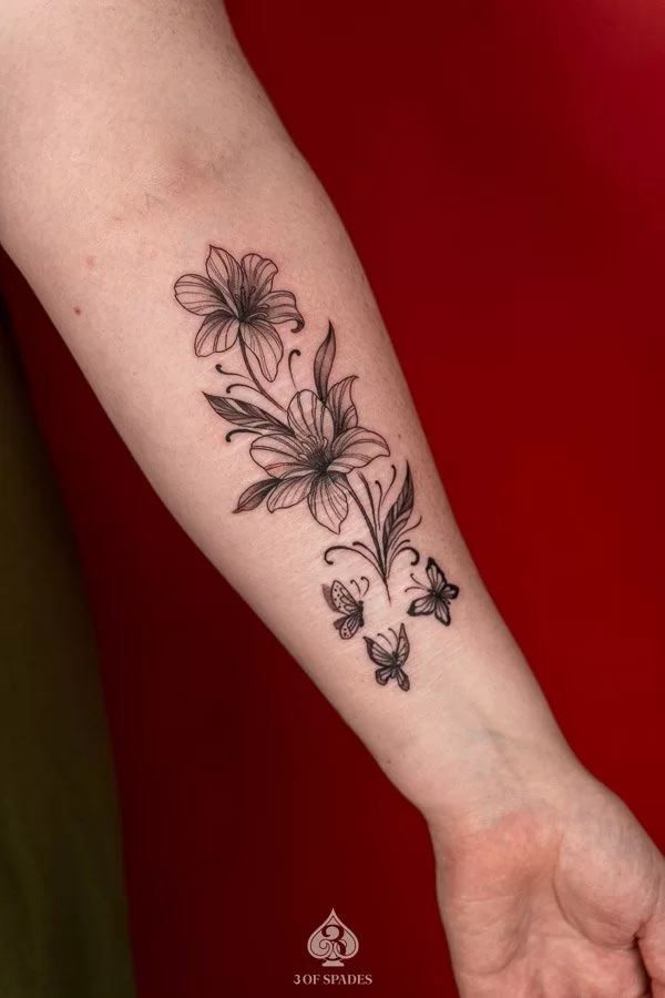 Lily Hand Flower Tattoo