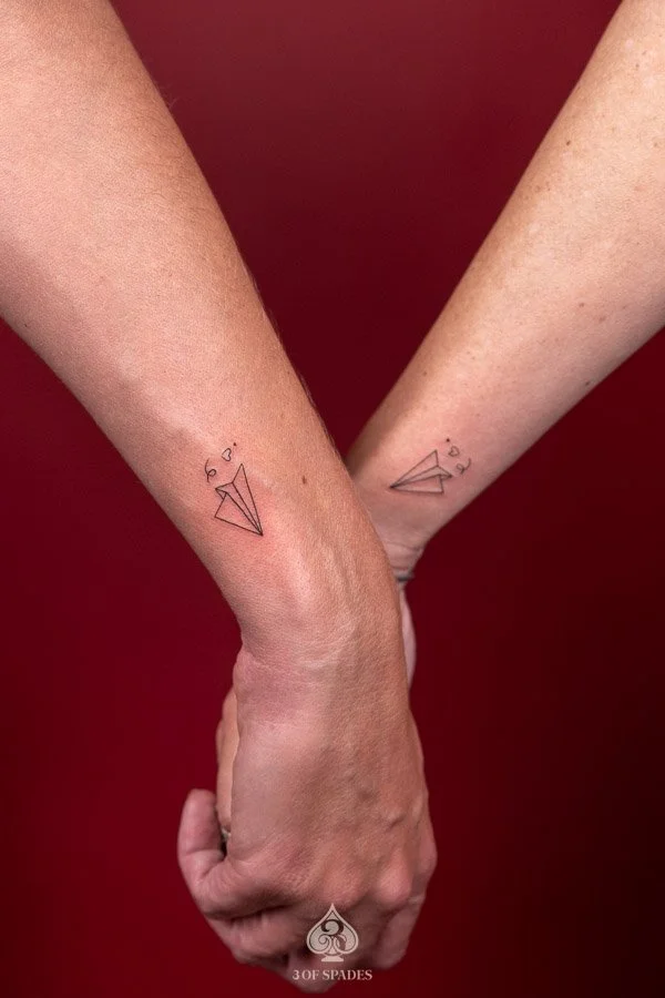 Matching Paper Airplane Tattoo