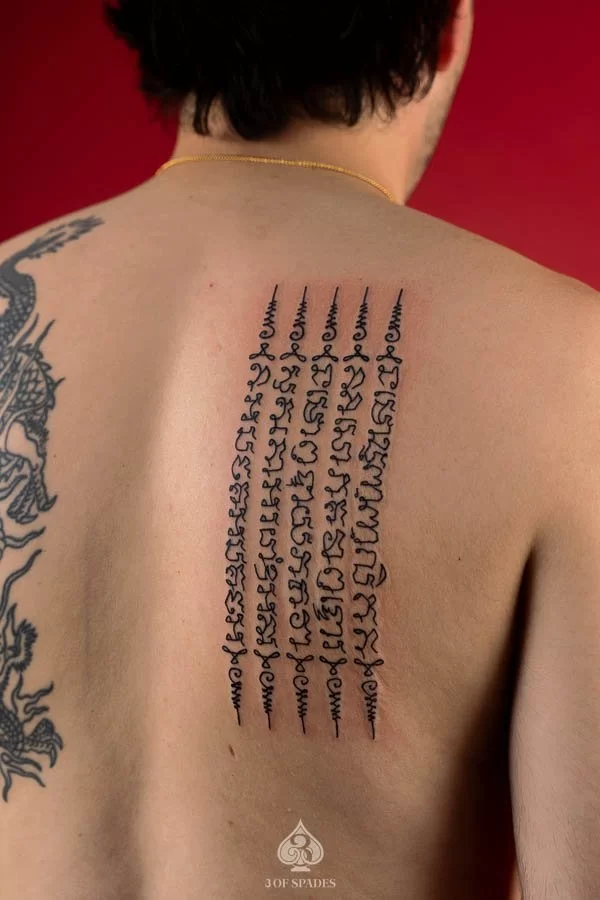 Micro-blackwork Sak Yant Tattoo