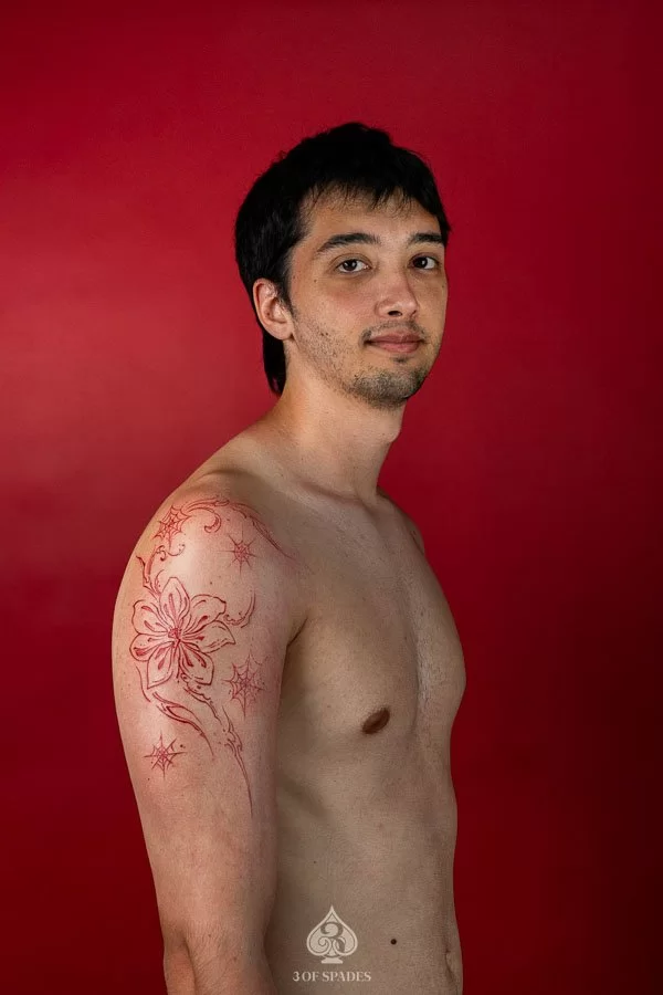 Red Fine Line Flower Tattoo | 3 of Spades Hanoi