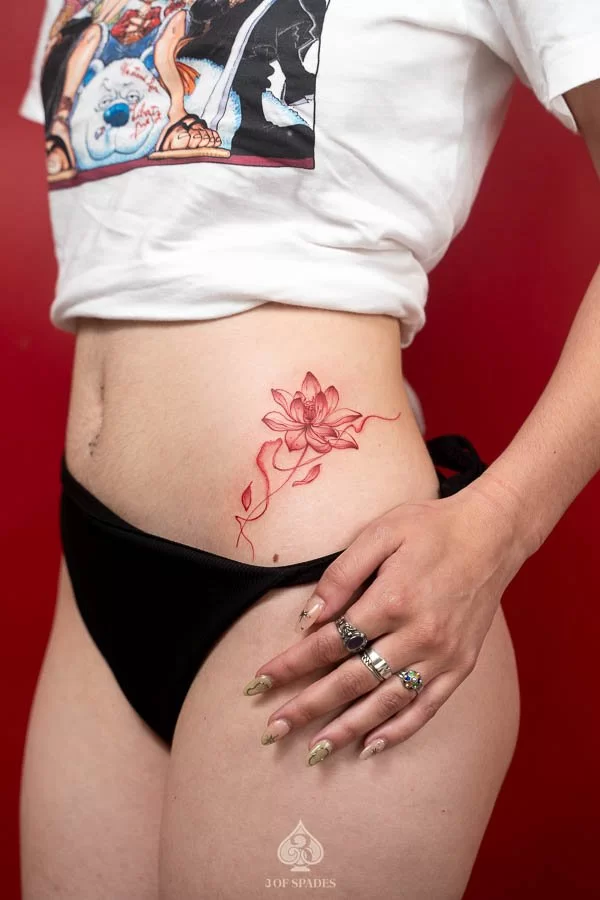 Red Lotus Hip Tattoo