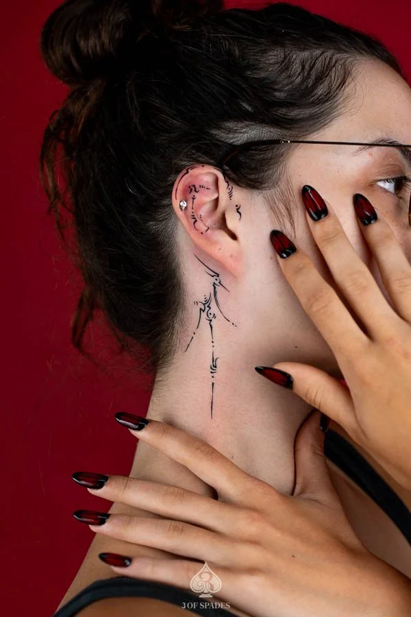 Asemic Neck to Ear Tattoo