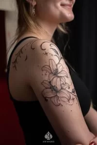 Lily Tattoo Meaning: Symbolism by Flower Type, Styles, and Placement Ideas