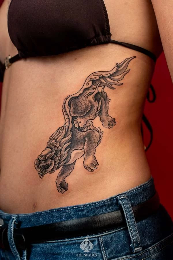 Qilin Rib Tattoo