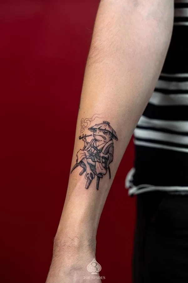 Illustrative Smoking Frog Tattoo