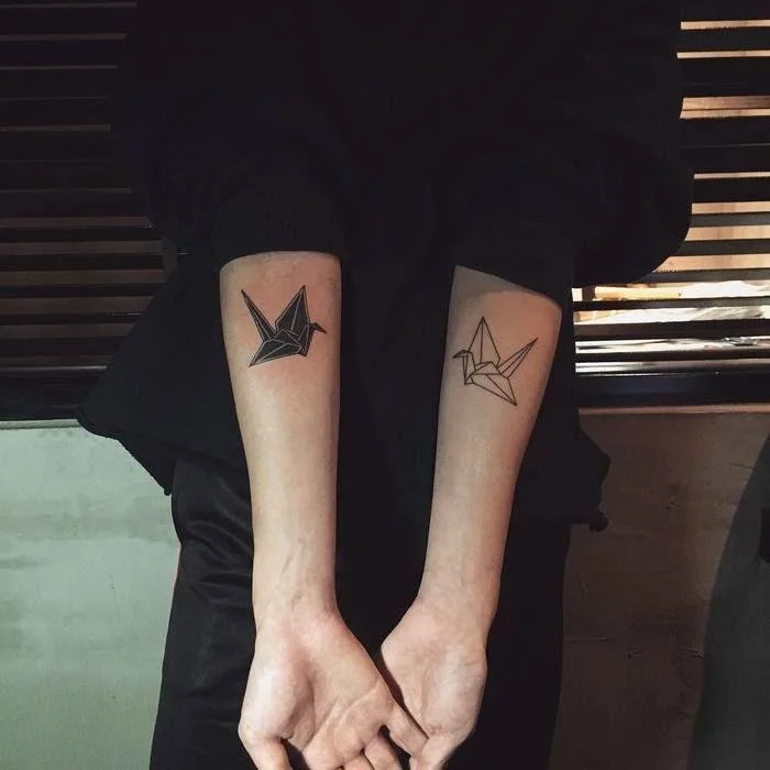 matching origami couple tattoo