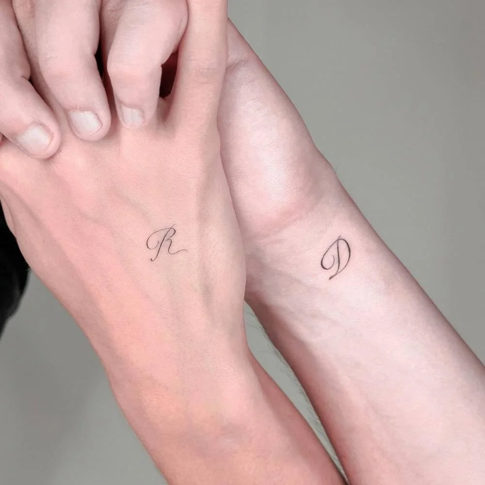 couple tattoo matching letter wrist