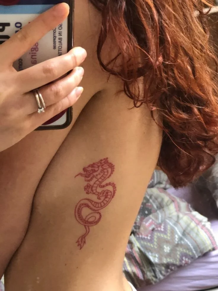 side breast tattoo dragon idea for women
