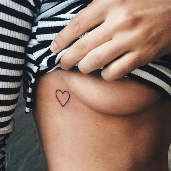 side breast tattoo heart for women