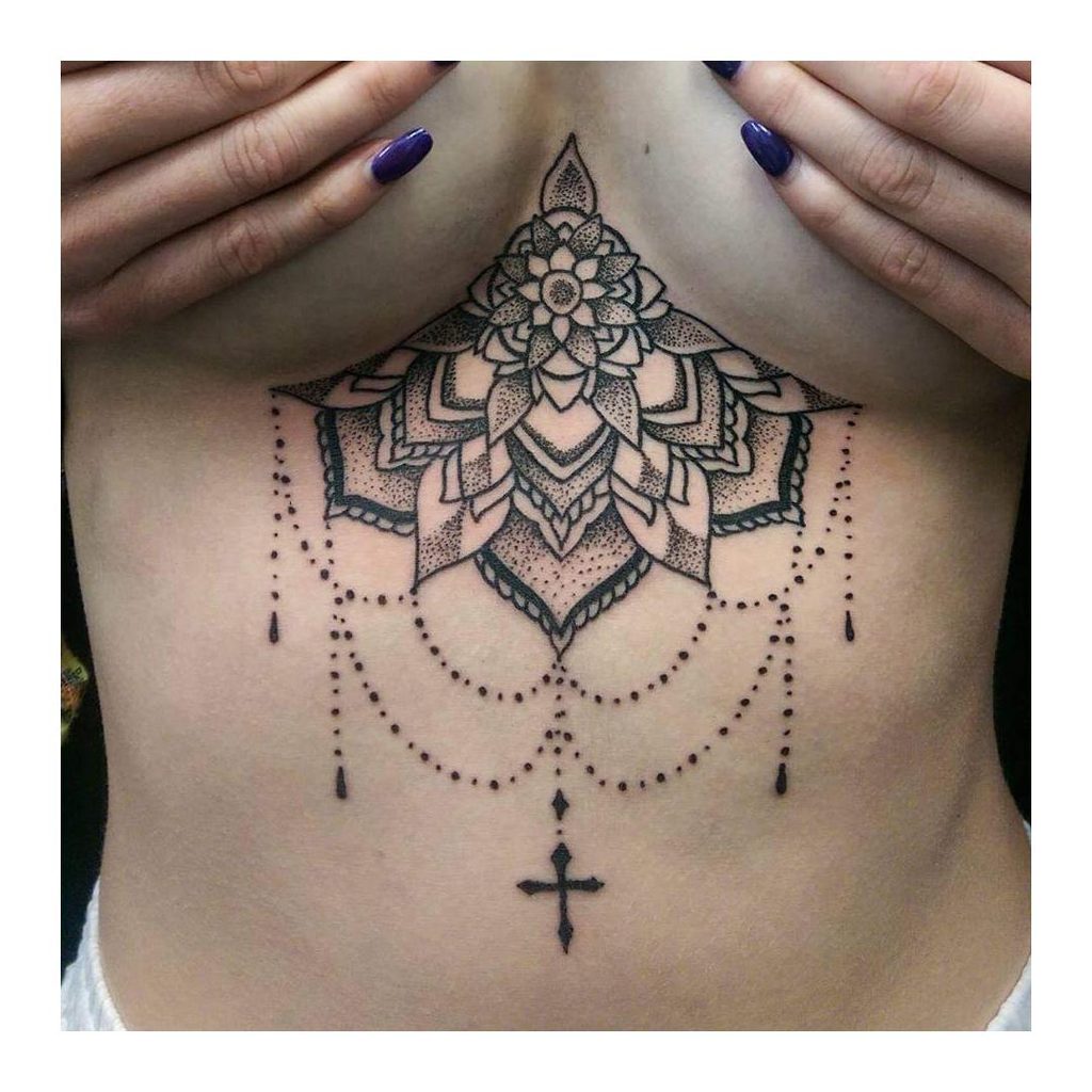mandala breast tattoo for women