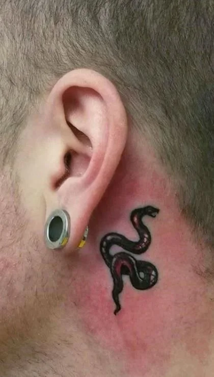 behind ear tattoo mini snake