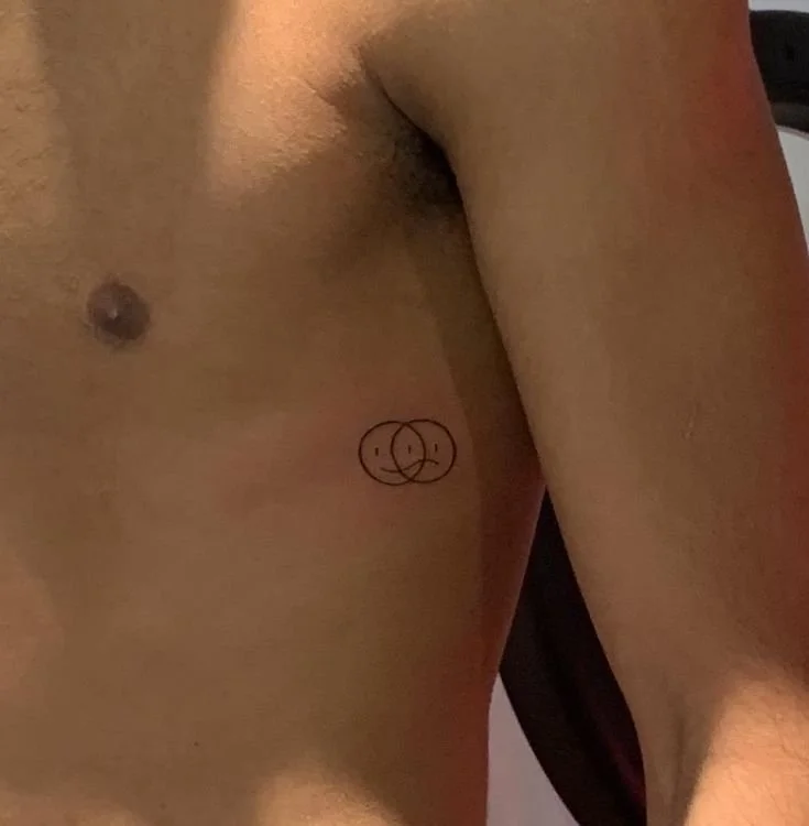 minimalism side breast tattoo for men