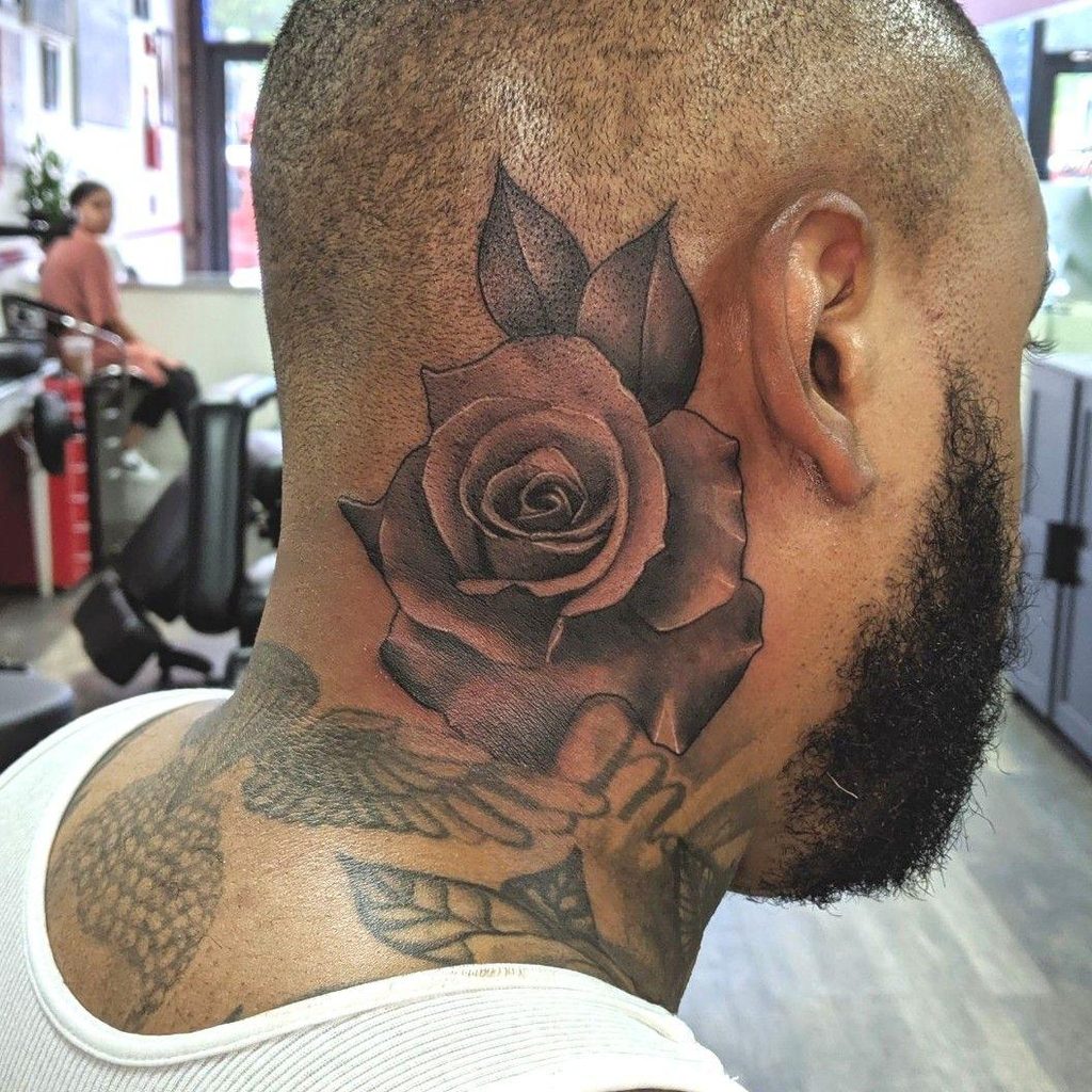 how pain is side neck tattoo