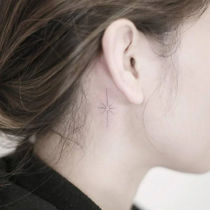 tiny star neck tattoo