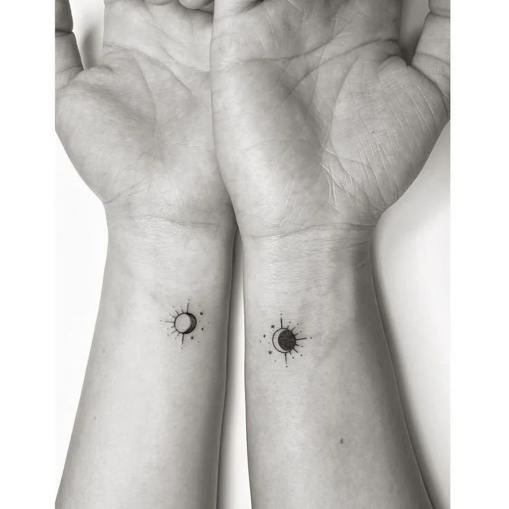 sun and moon couple tattoo on wrist