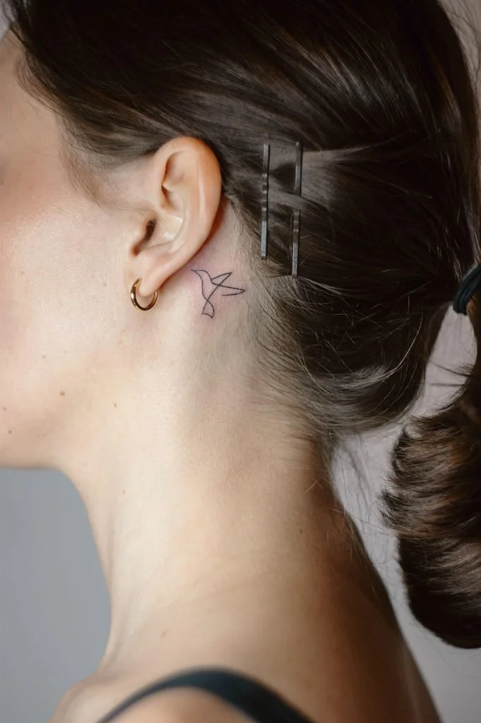 idea for bird neck tattoo