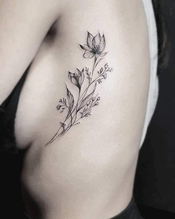 women side breast tattoo 1