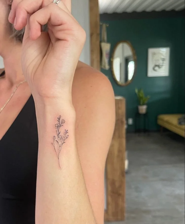 wrist tattoo for women birth floral