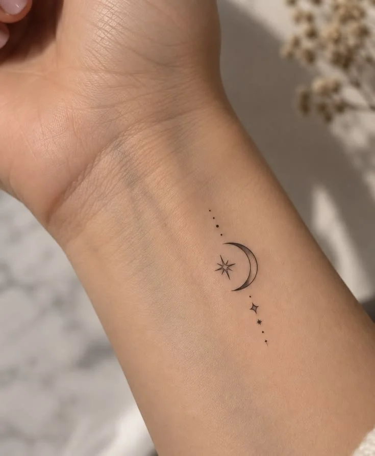 moon and star wrist tattoo idea