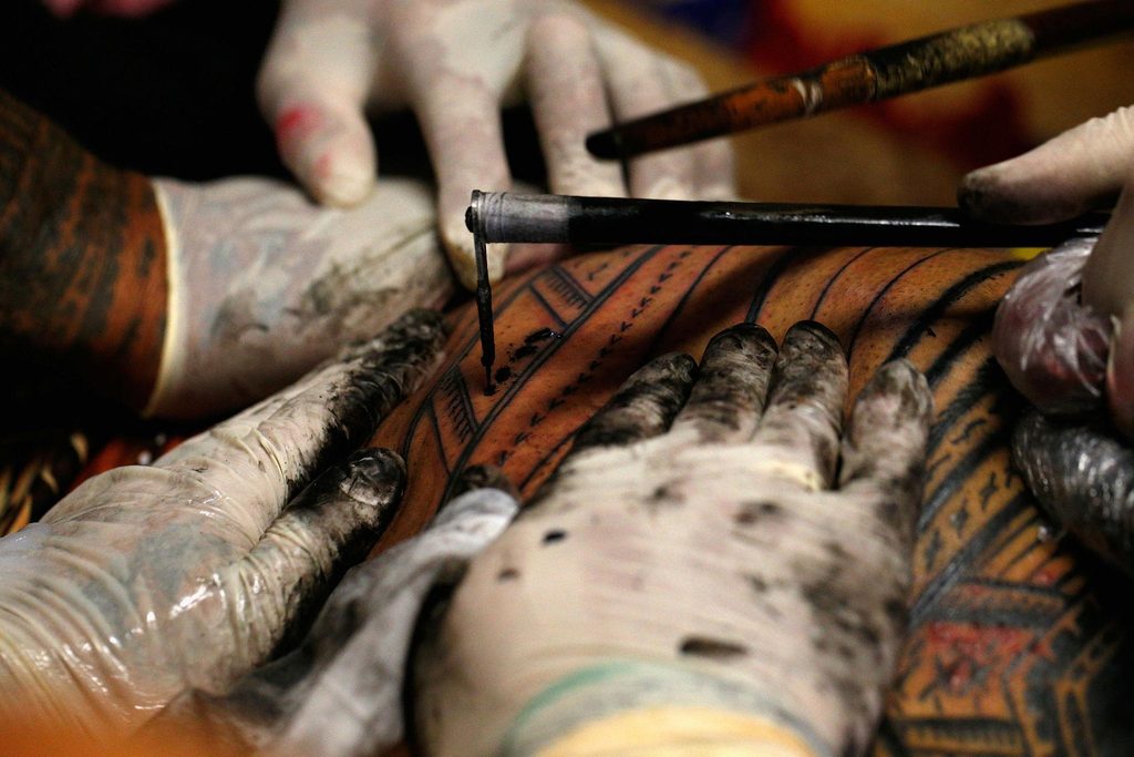 Polynesian Blackwork Tattoo designs are frequently associated with bold black pigment, but the traditional methods used to apply tattoos differ across communities.