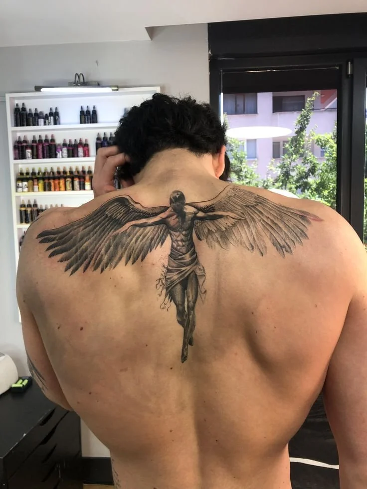 Realism tattoo with angel back