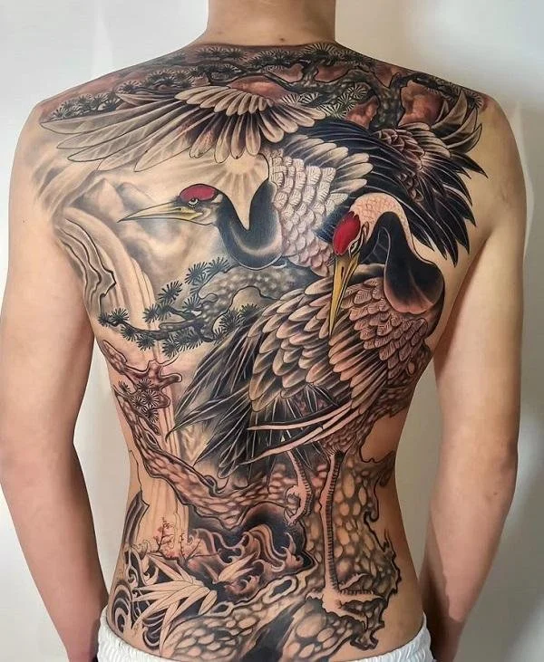 black and full back japanese crane tattoo