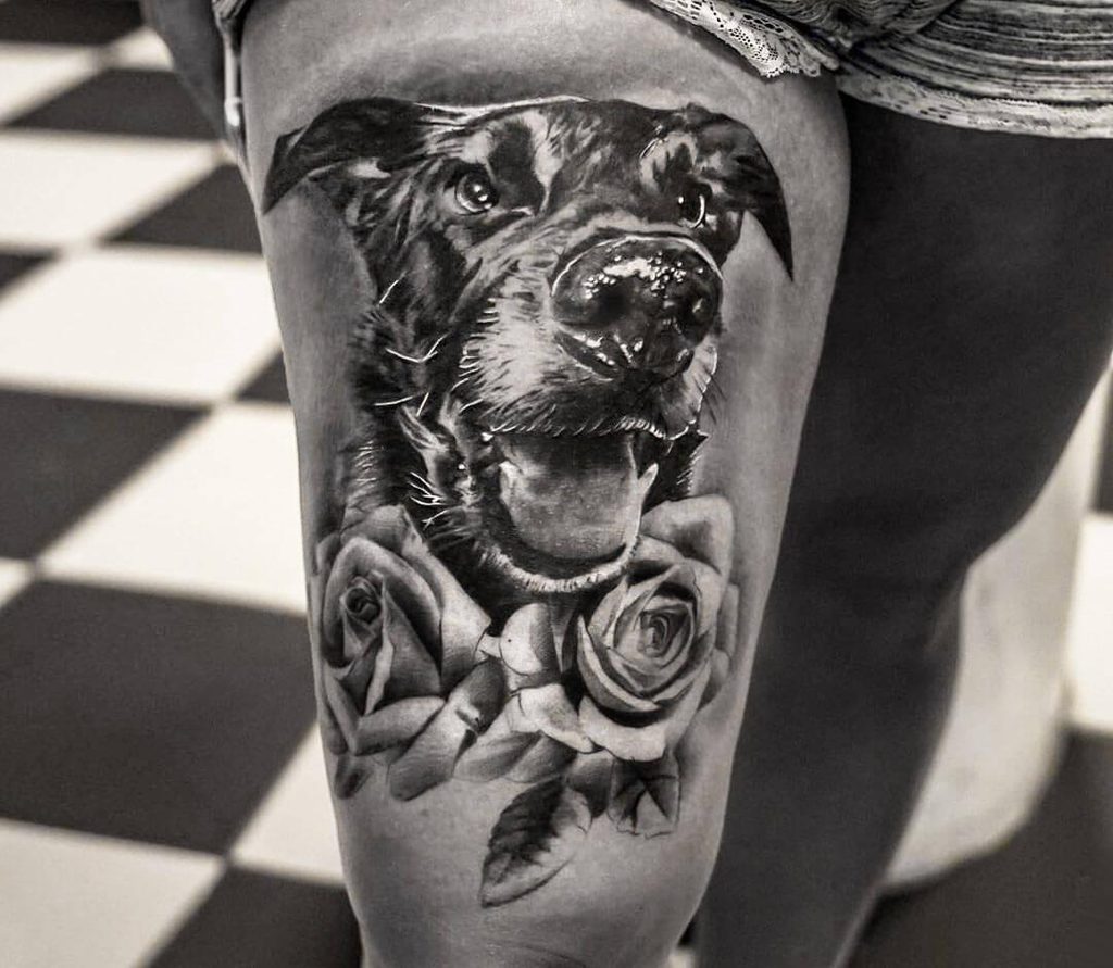 Popular black and grey realism tattoo designs | dog