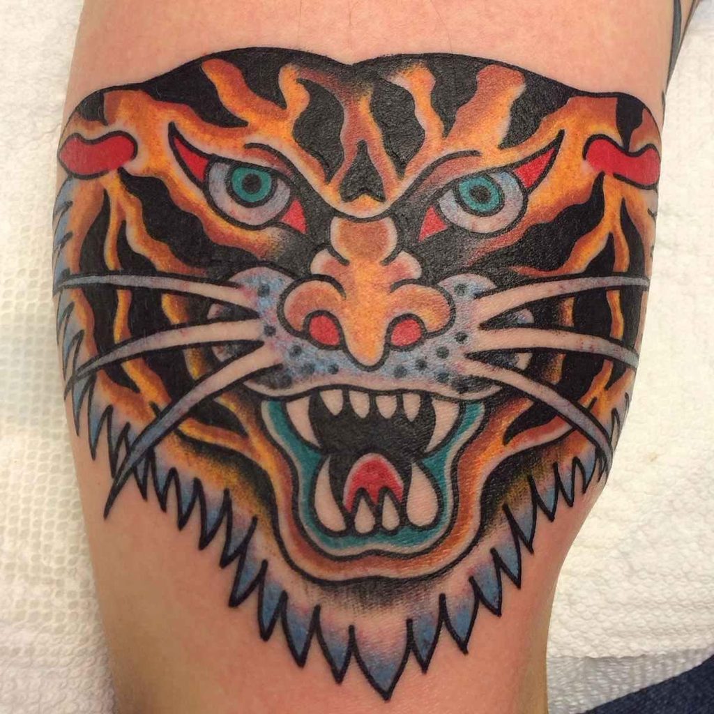 realism tattoo and traditional tattoo tiger